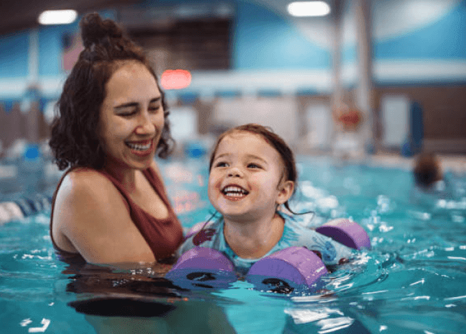  Her daughter Lisa's first swimming lesson 